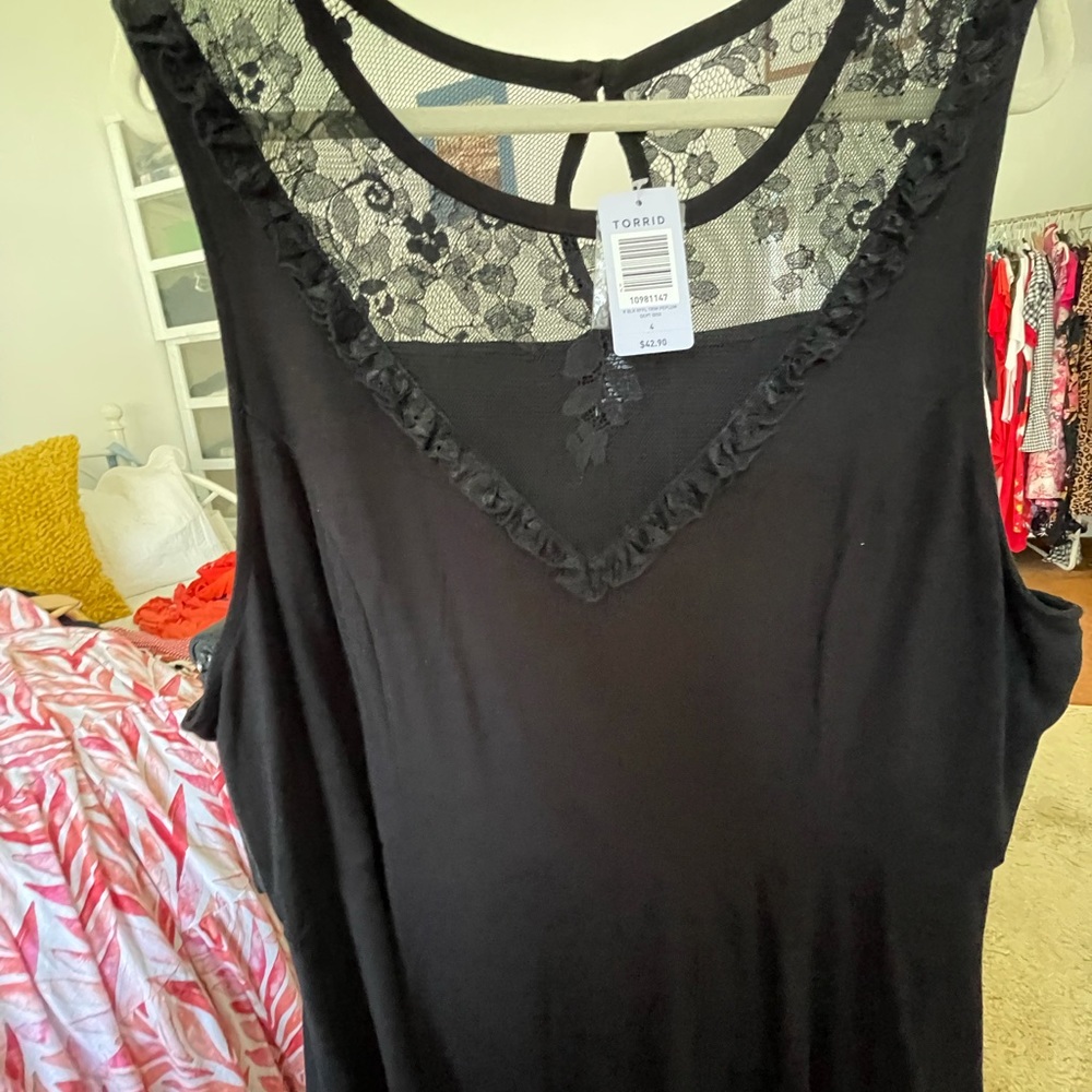 Sexy Torrid sleeveless lace peplum dressy top.